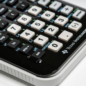 black and white Texas Instruments calculator